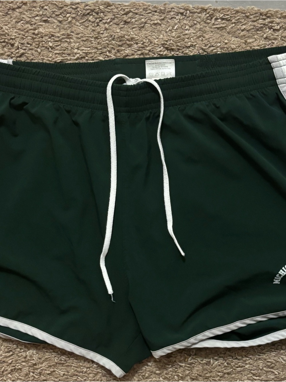 Under Armour Woman’s Md Green Athletic Shorts with White Trim Spartan Design
